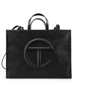 Telfar Large Black Shopper new with tags.  Never used. Includes dust bag .